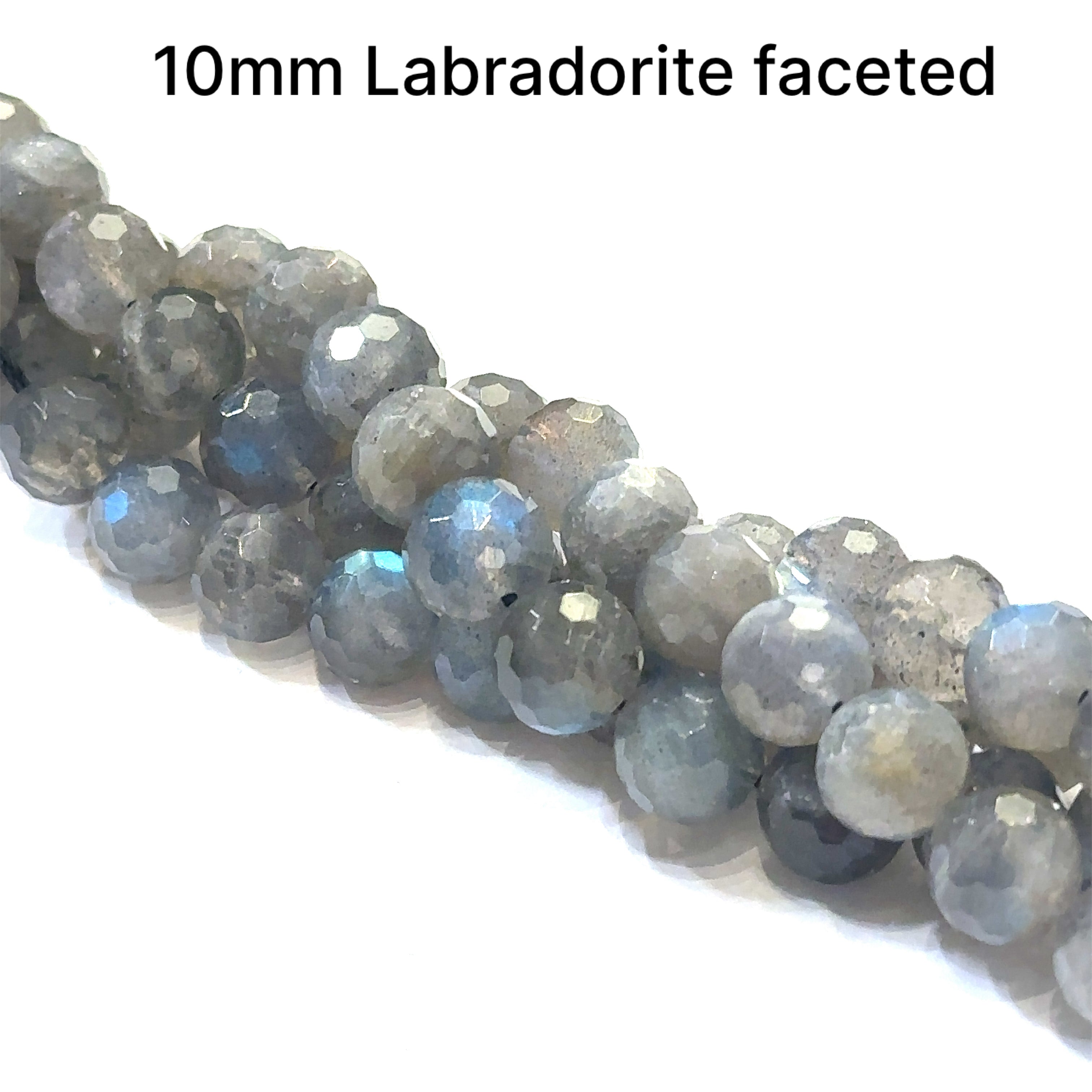 10mm faceted  round Labradorite beads on a white background, front overview. 