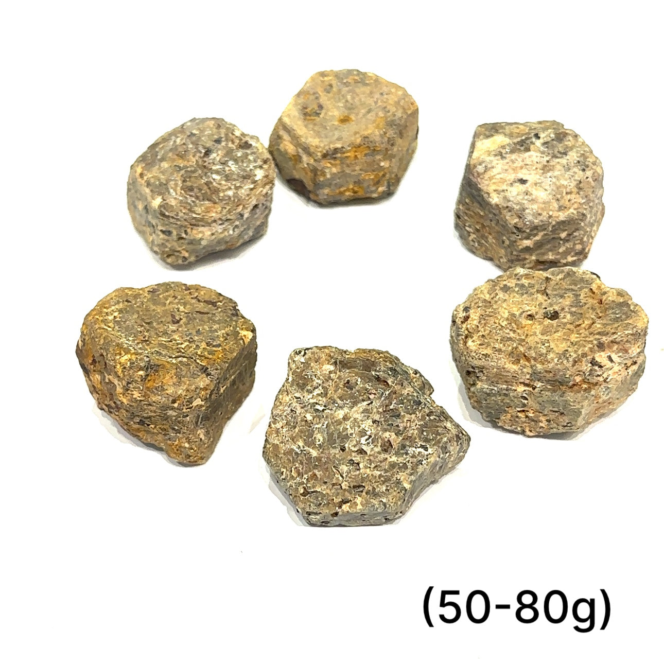 Golden Sapphire raw gemstone with bronze-golden sheen symbolizing strength and prosperity grouping of (50-80g) on white overview