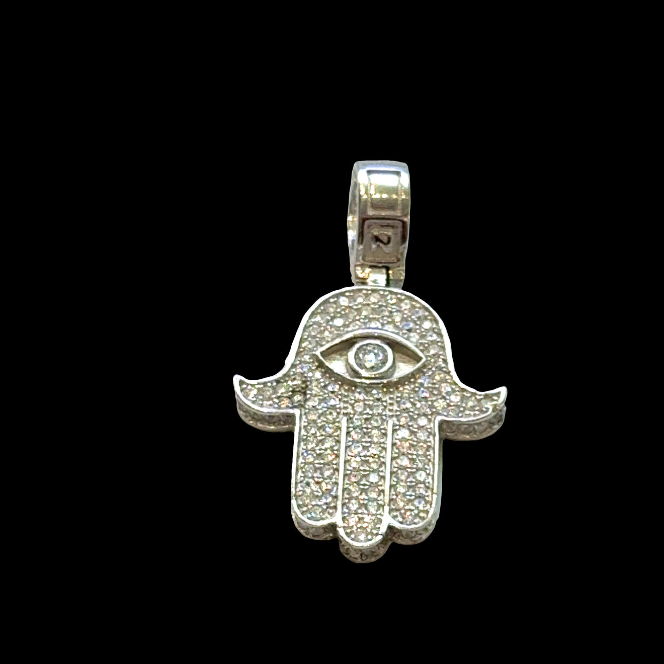 #2 Silver Hamsa hand pendant with eye design on a black background, front view.