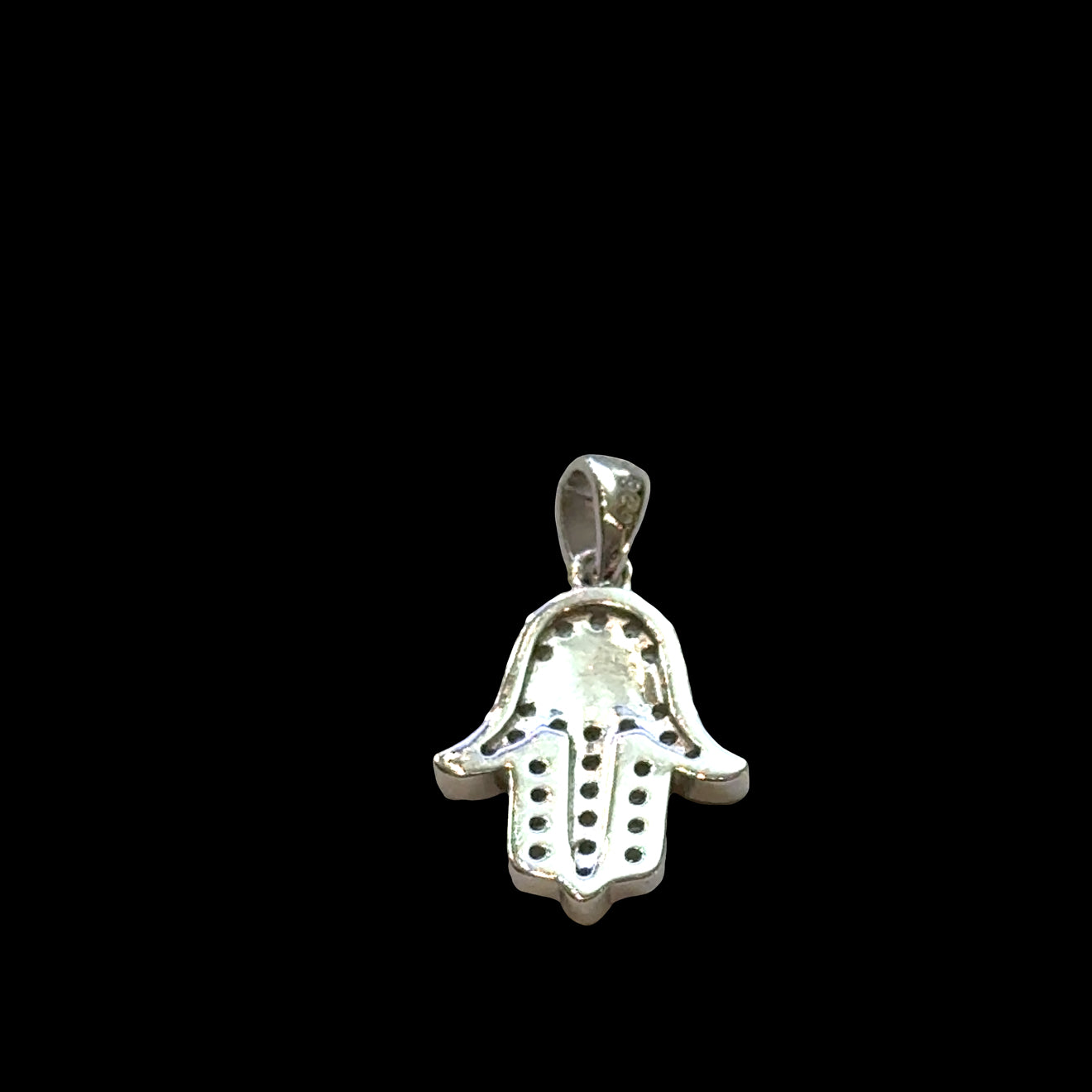 #3 Silver Hamsa hand pendant with eye design on a black background, back view.