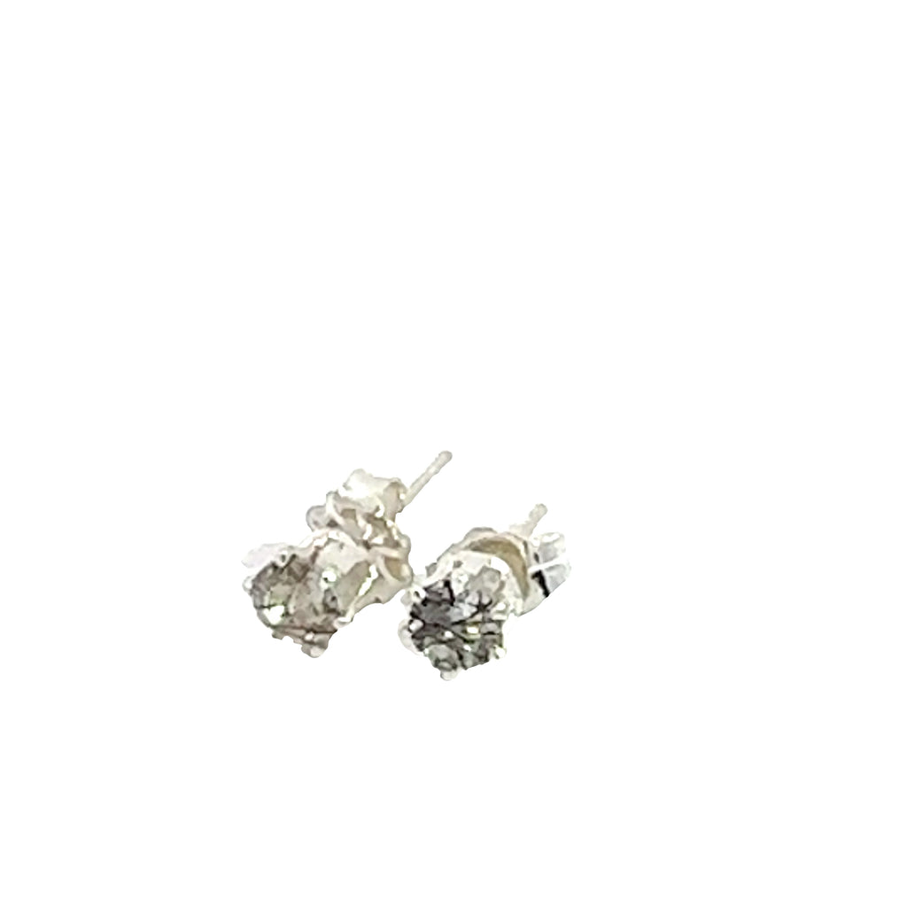 4mm faceted Rutilated Quartz stud earrings in sterling silver basket setting on a white background left front angle overview.