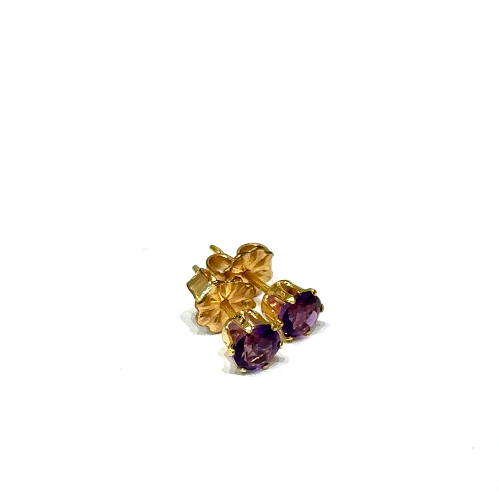 4mm faceted round Amethyst stud earrings in gold filled 6-prong setting on a white background front right angle overview.