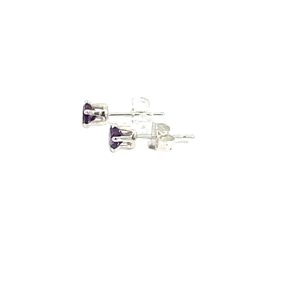 4mm faceted round Amethyst stud earrings in sterling silver 6-prong setting on a white background left side overview.