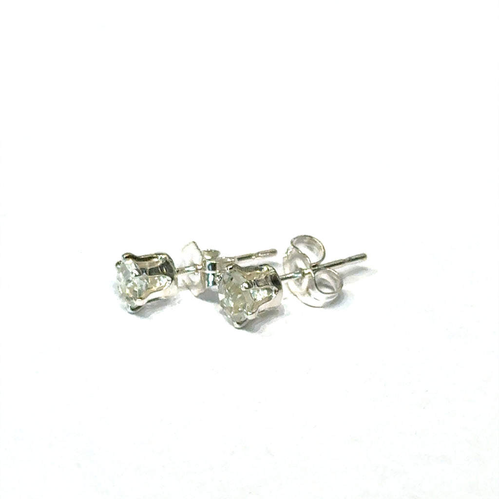 4mm round Prasiolite Green Amethyst stud earrings in sterling silver double prong setting on white background slight left angle overview.