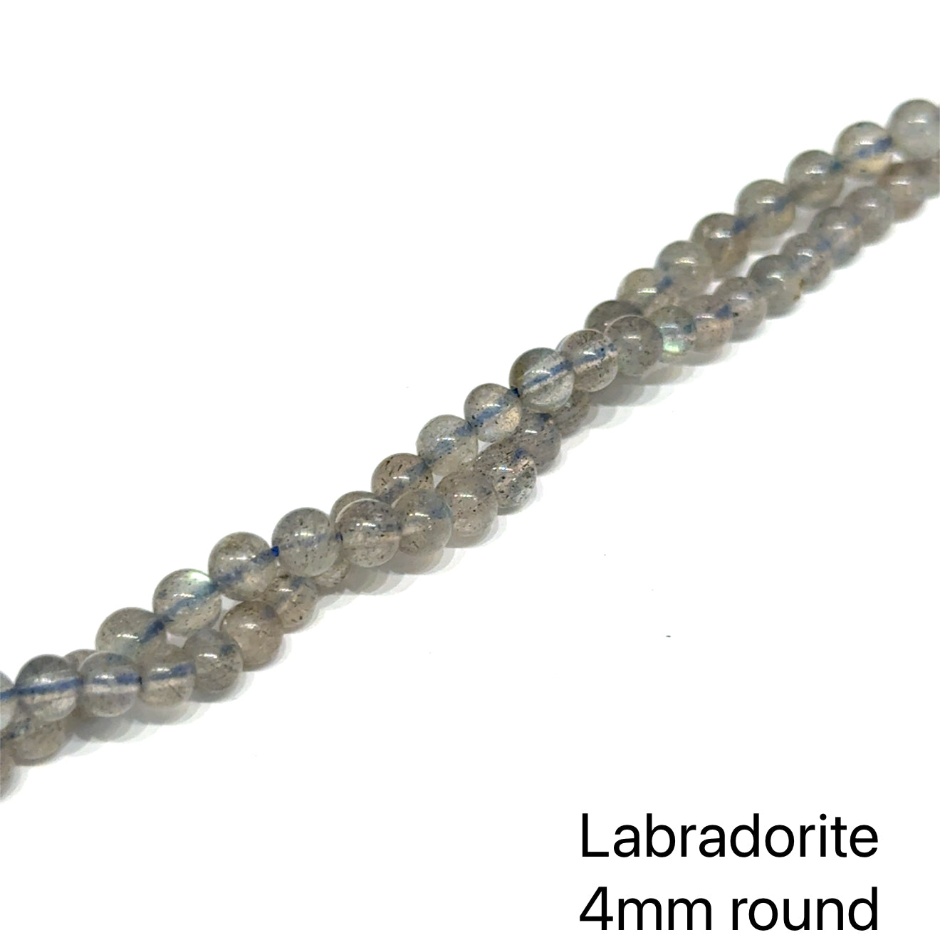 4mm smooth round Labradorite beads on a white background, front overview. 