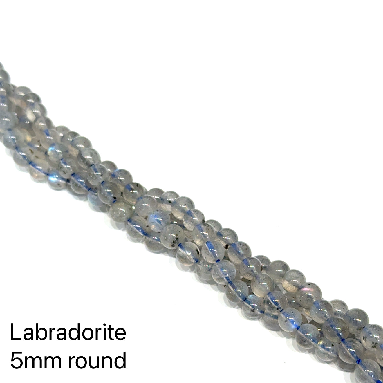 5mm smooth round Labradorite beads on a white background, front overview. 