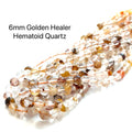 6mm Golden Healer Hematoid Quartz Strand on white center overview 