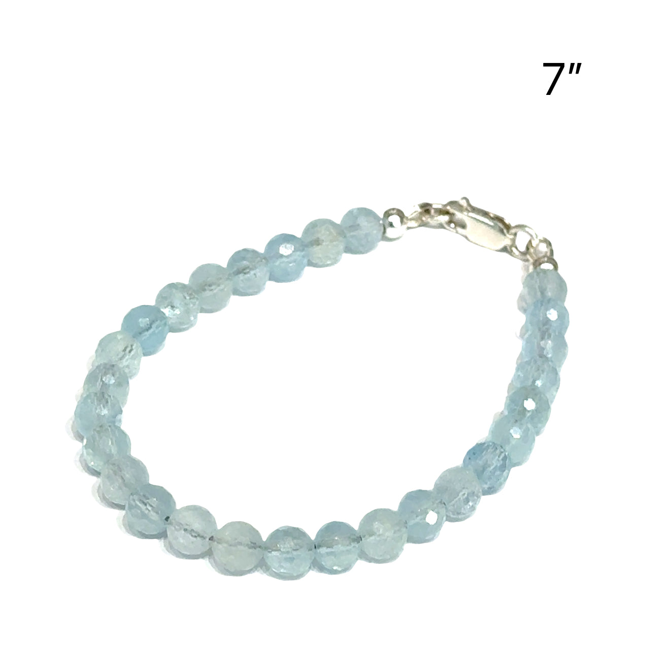 6mm Micro faceted round Aquamarine gemstone beaded bracelet with sterling silver lobster claw clasp size 7'' showing pale blue color  translucent on a white background right angle overview. 