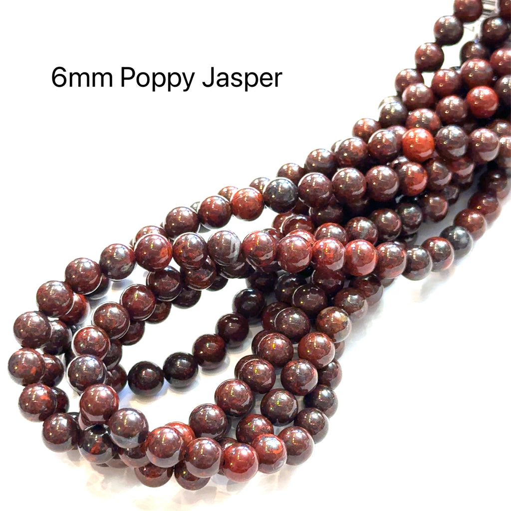 6mm Poppy Jasper Gemstone Strand on white long overview