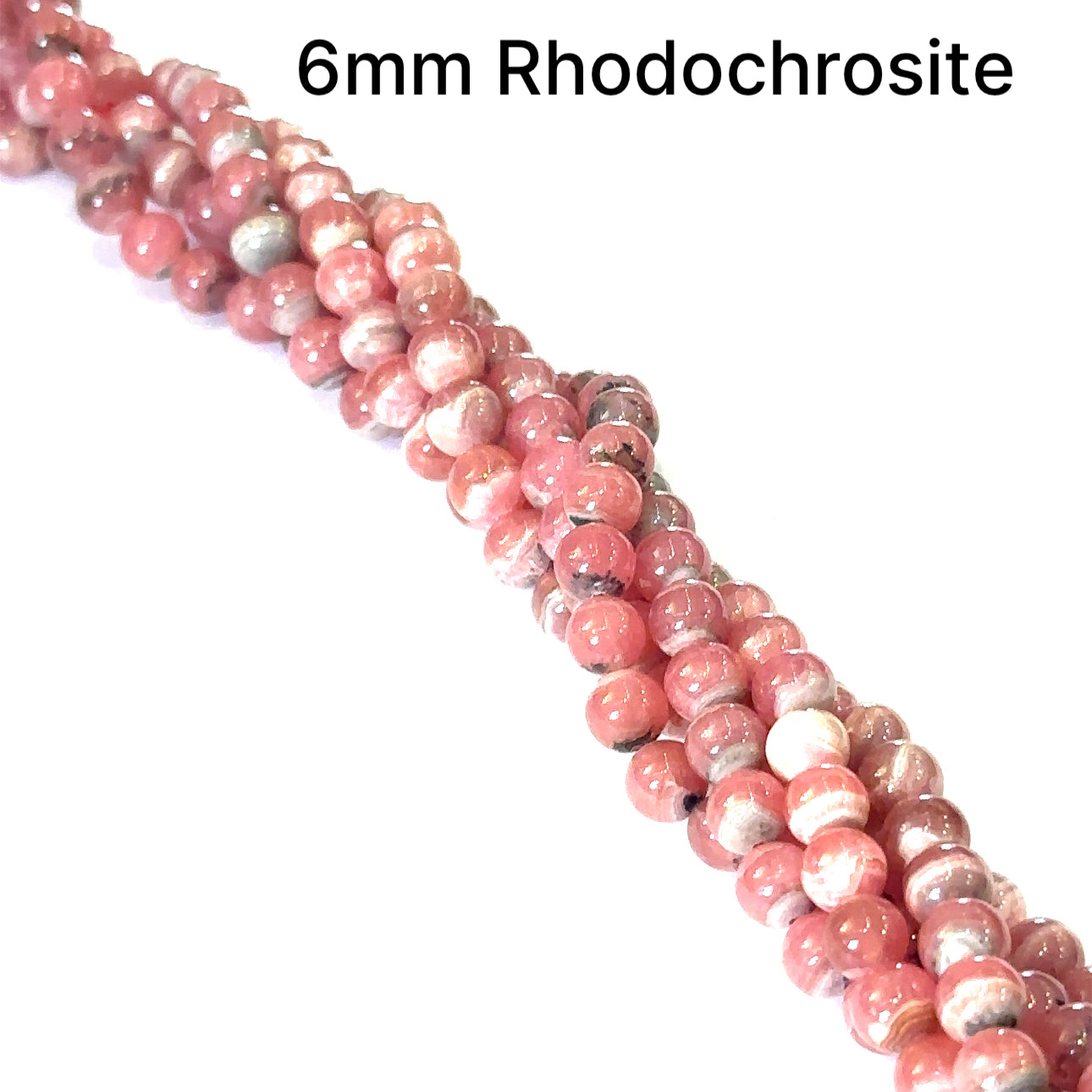 6mm Rhodochrosite smooth round gemstone strand on a white background, front  close up overview.