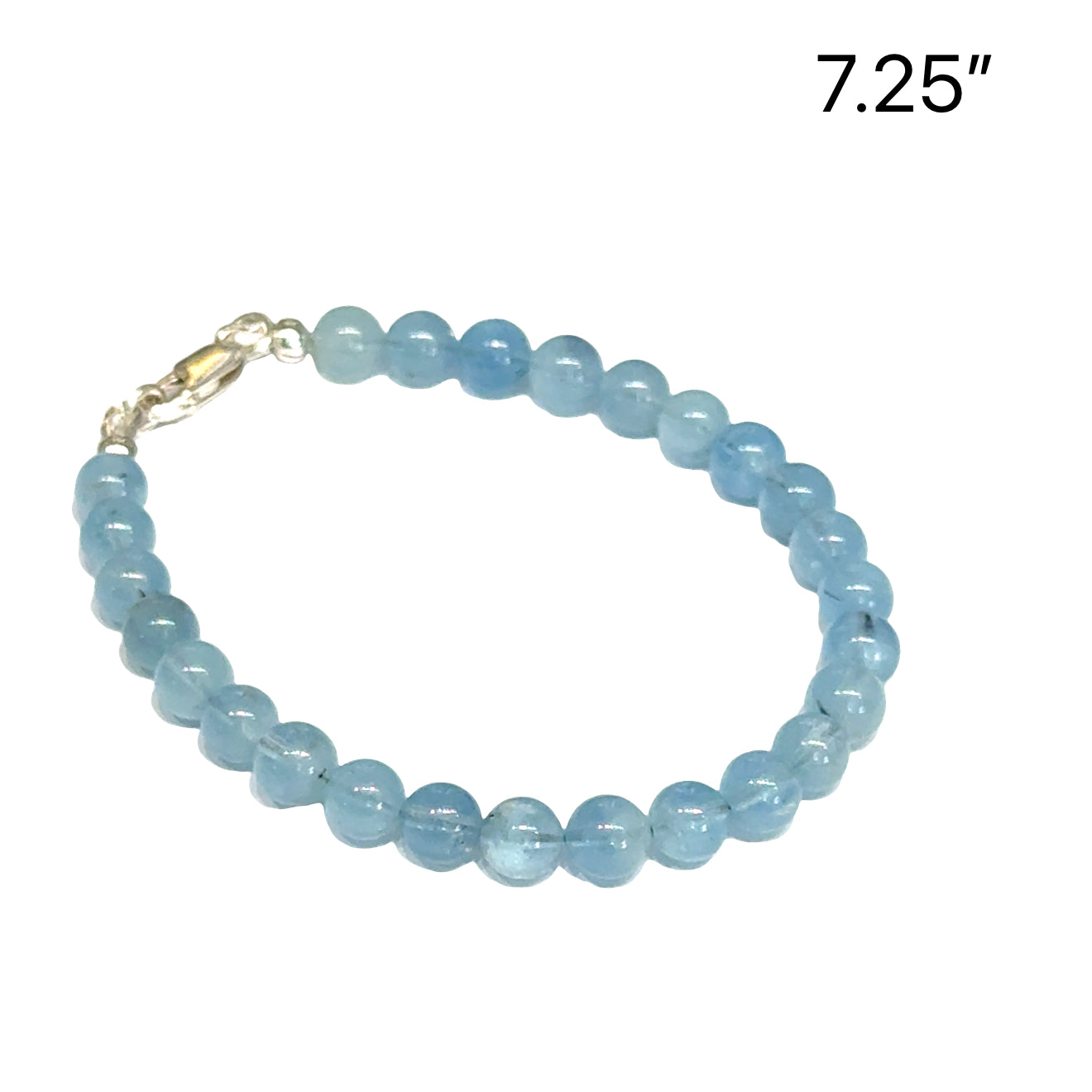 6mm smooth round Aquamarine gemstone beaded bracelet with sterling silver lobster claw clasp size 7.25'' showing pale blue color  translucent on a white background front  right angle overview. 
