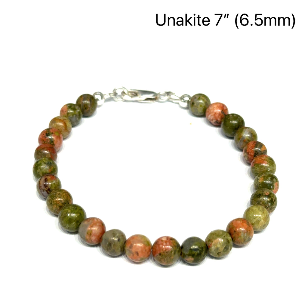 7'' Unakite beaded bracelet with 6mm smooth round gemstones and a sterling silver lobster claw clasp for gentle emotional healing, on a white background, front view. 