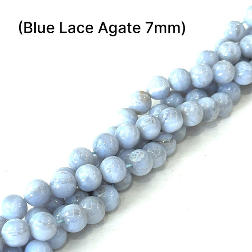 7mm Blue lace Agate smooth round gemstones on a white background, front overview. 