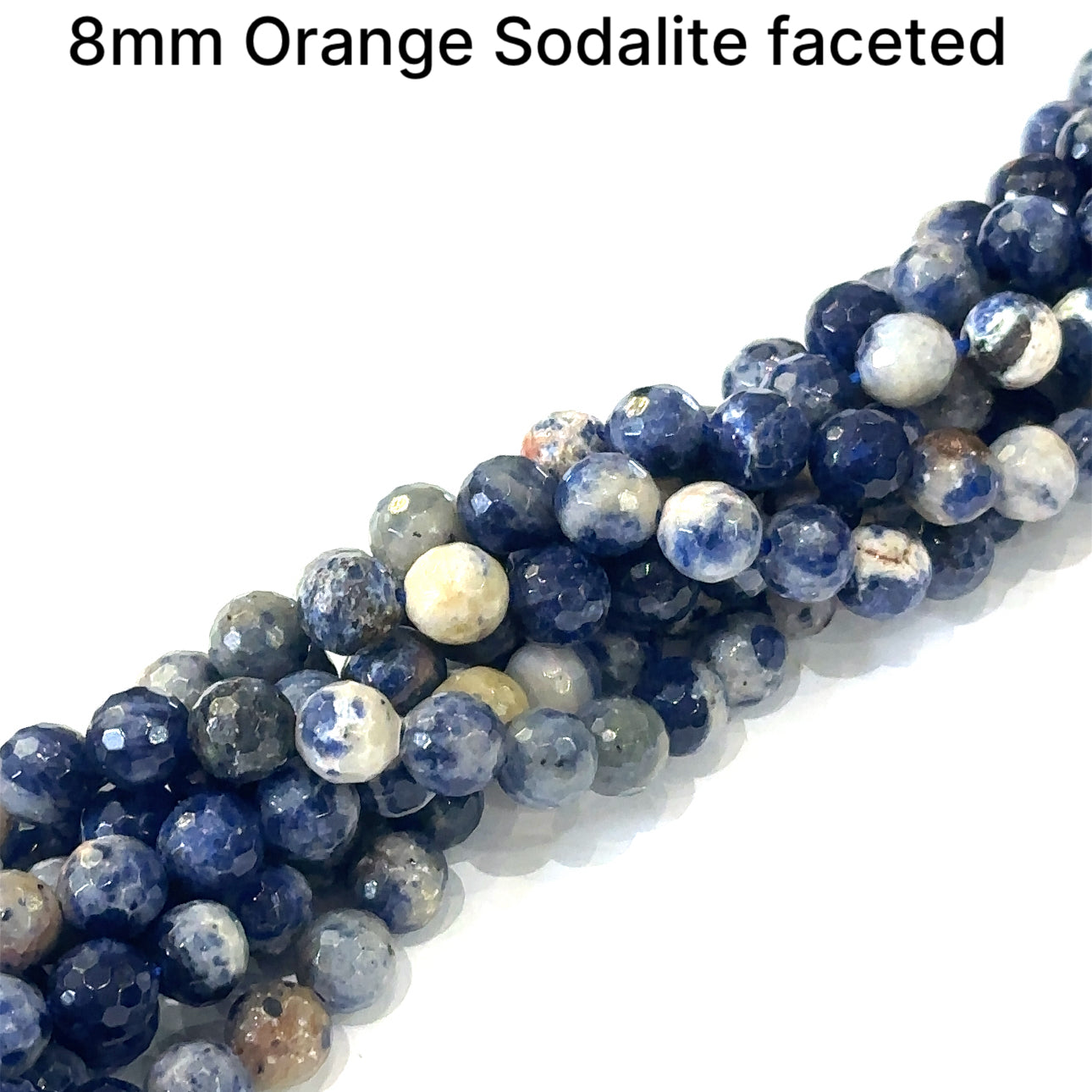 8mm  Sodalite faceted round gemstone strand on a white background, front close up  overview.