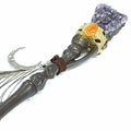A Amethyst gemstone wand  on a white background front view.