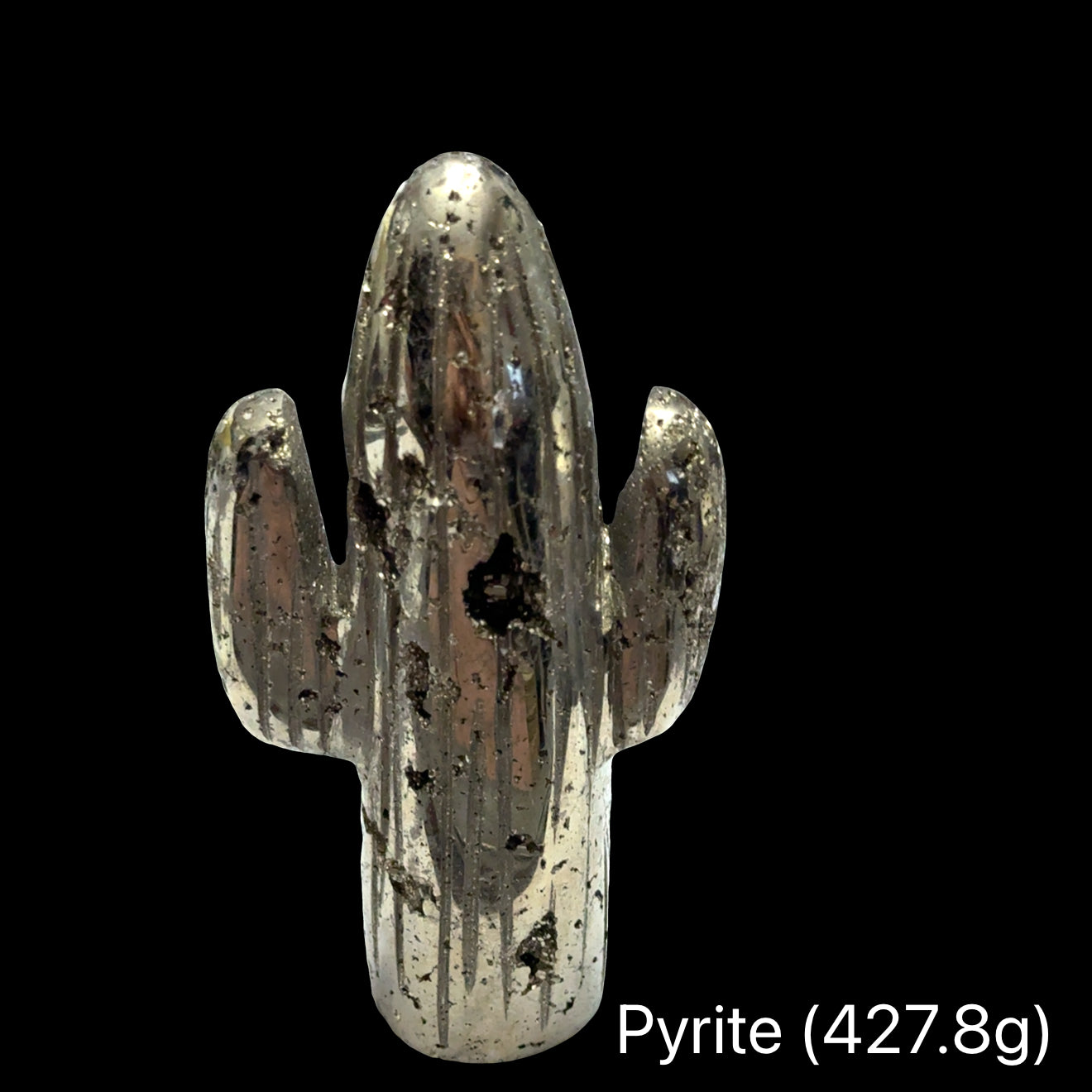 A Hand-carved pyrite cactus sculpture in metallic gold for manifestation and abundance on a black background, front view. 
