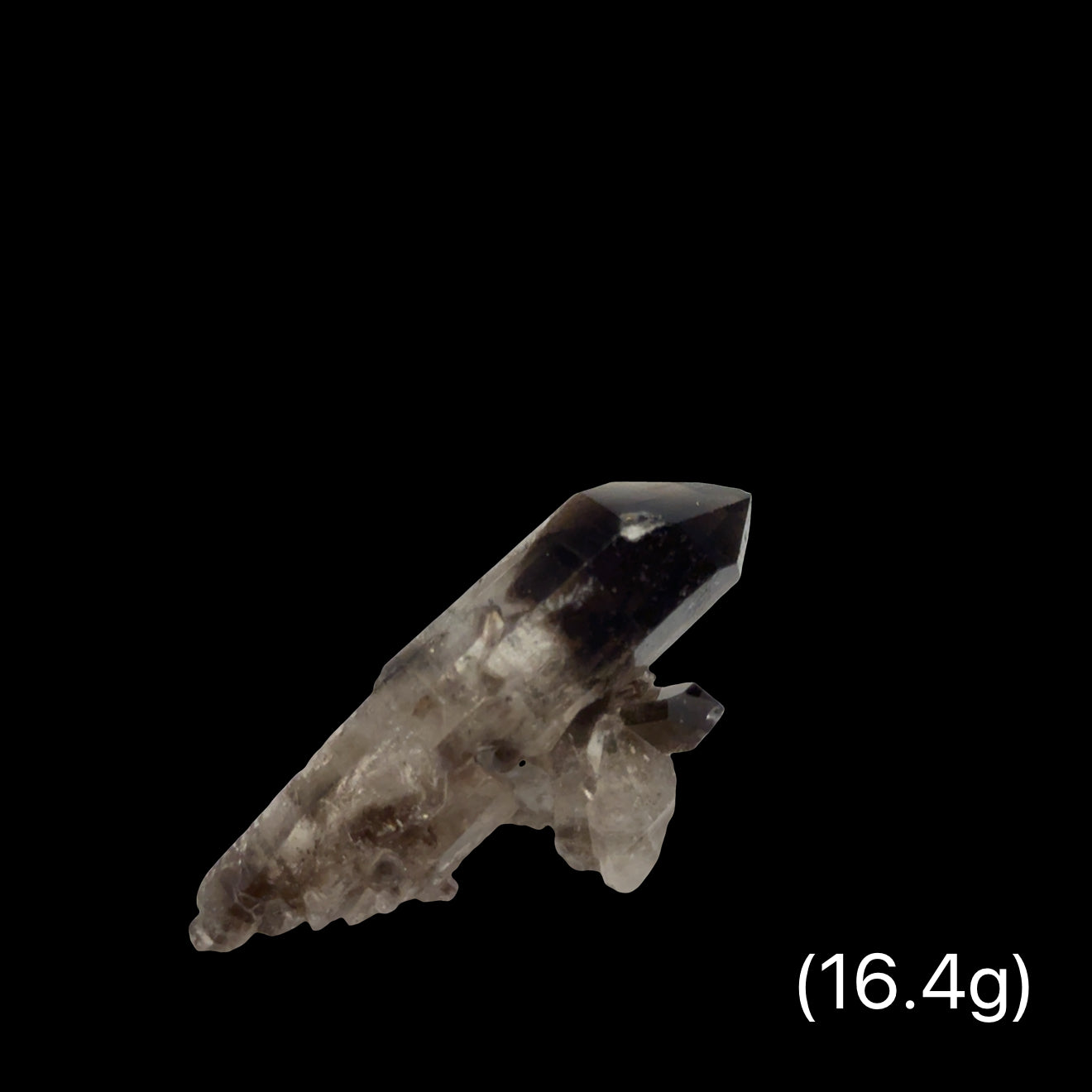 A Quartz crystals with phantoms and inclusions (16.4g) on a black background, front view.
