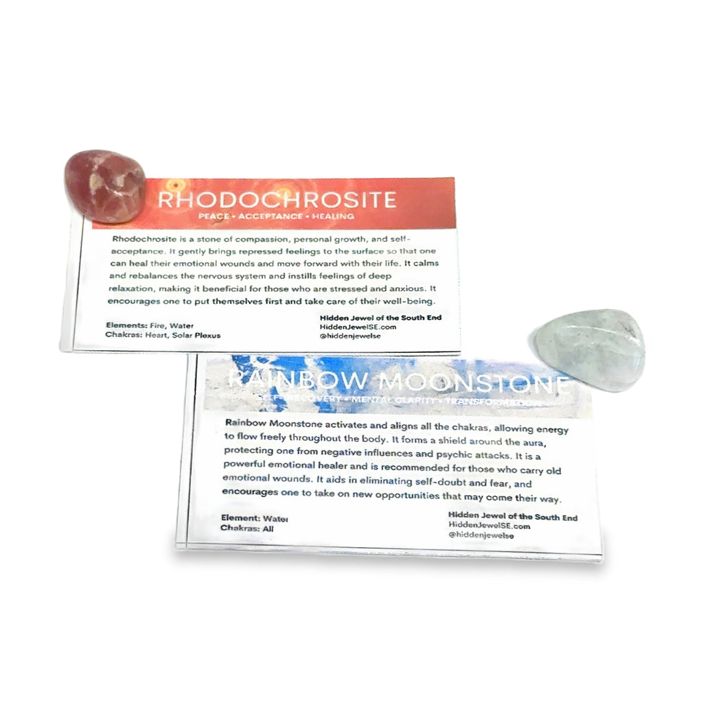 A Rodochrosite and a Rainbow Moonstone gemstone with the informational card on a white background, front view.