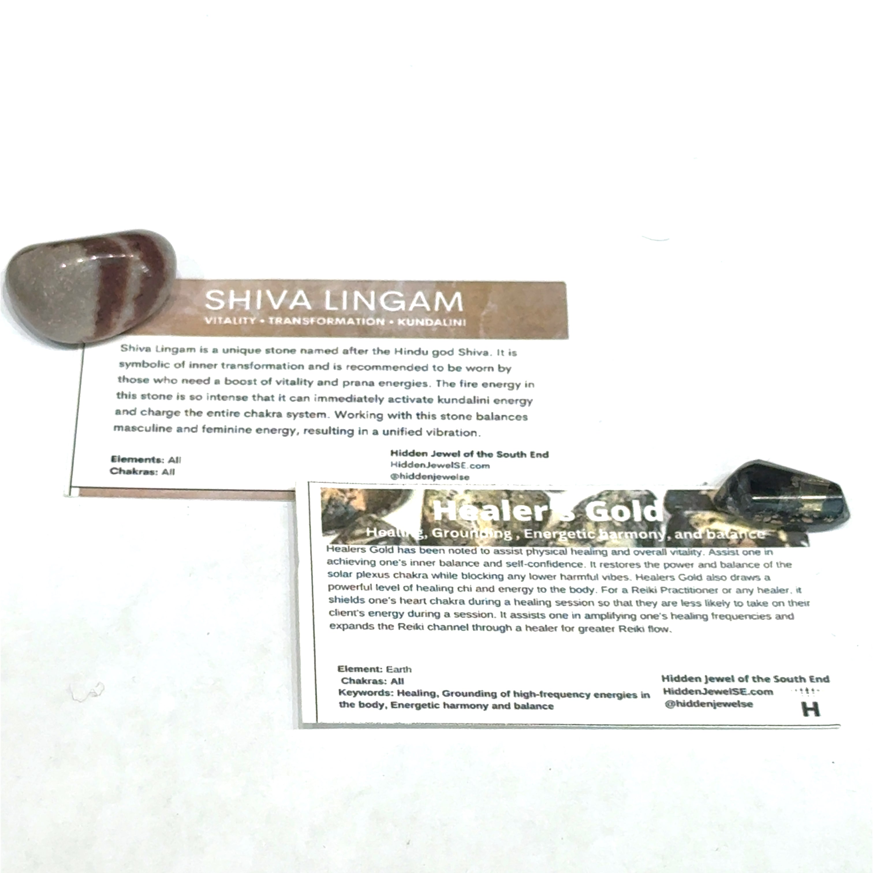 A Shiva Lingam and a Healers gold gemstone with the informational card on a white background, front view.