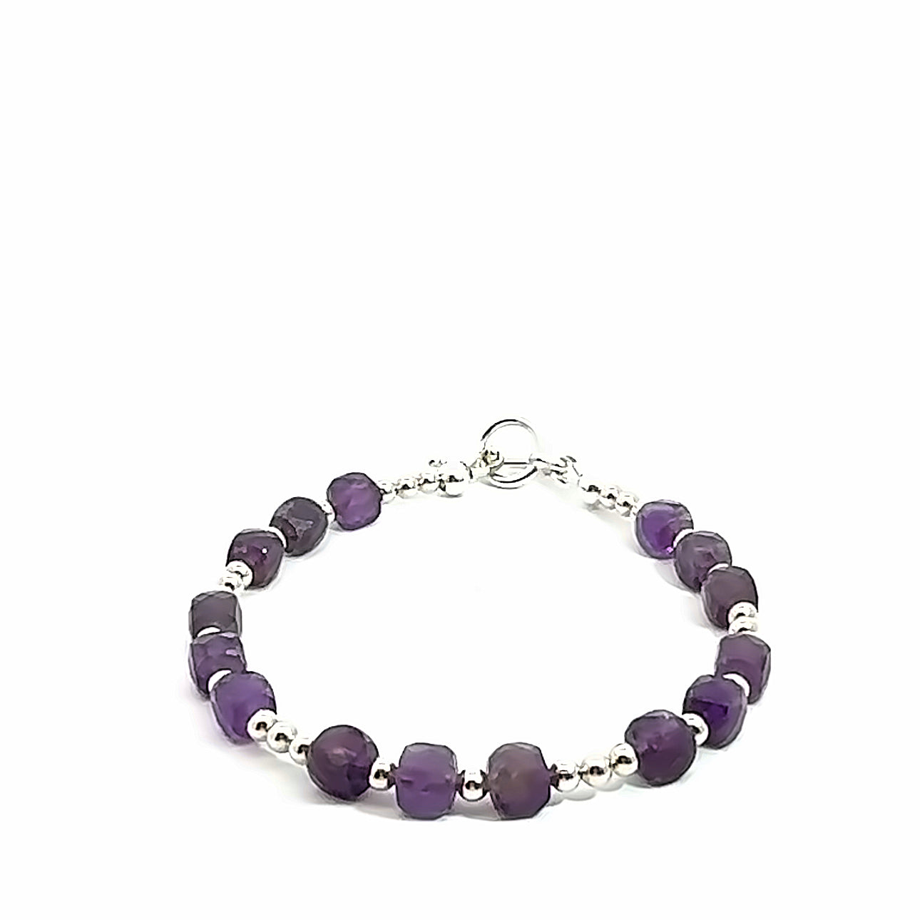 A beaded Amethyst faceted cube gemstone bracelets with a sterling silver beads and  toggle, displayed against a white background, front overview. 