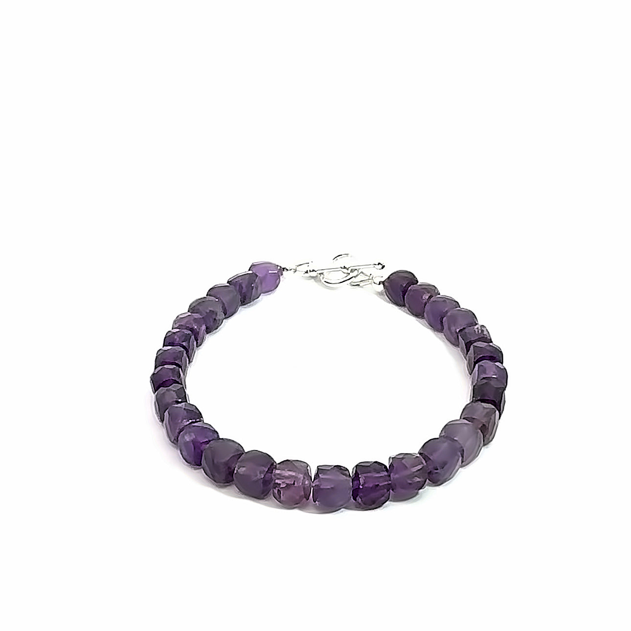 A beaded Amethyst faceted cube gemstone bracelets with a sterling silver toggle, displayed against a white background, front overview. 