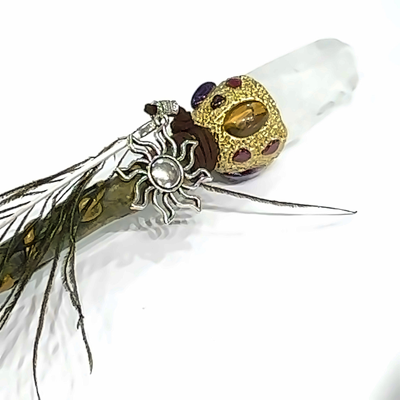 A clear Quartz gemstone wand  on a white background front view.
