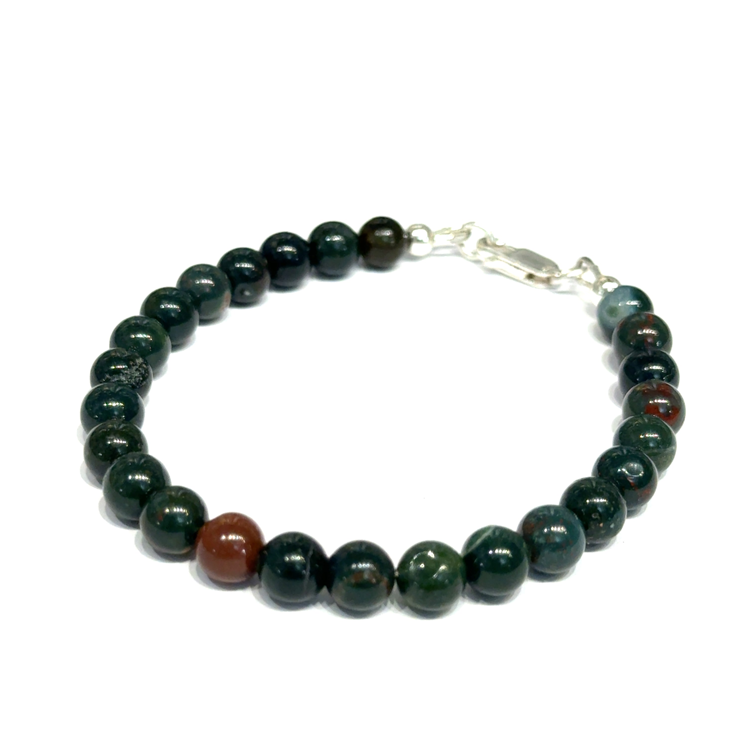 A close-up of polished bloodstone beaded gemstone bracelet  6mm size 7.25''  showing deep forest green jasper with natural red hematite inclusions on a white background, front left angle overview. 