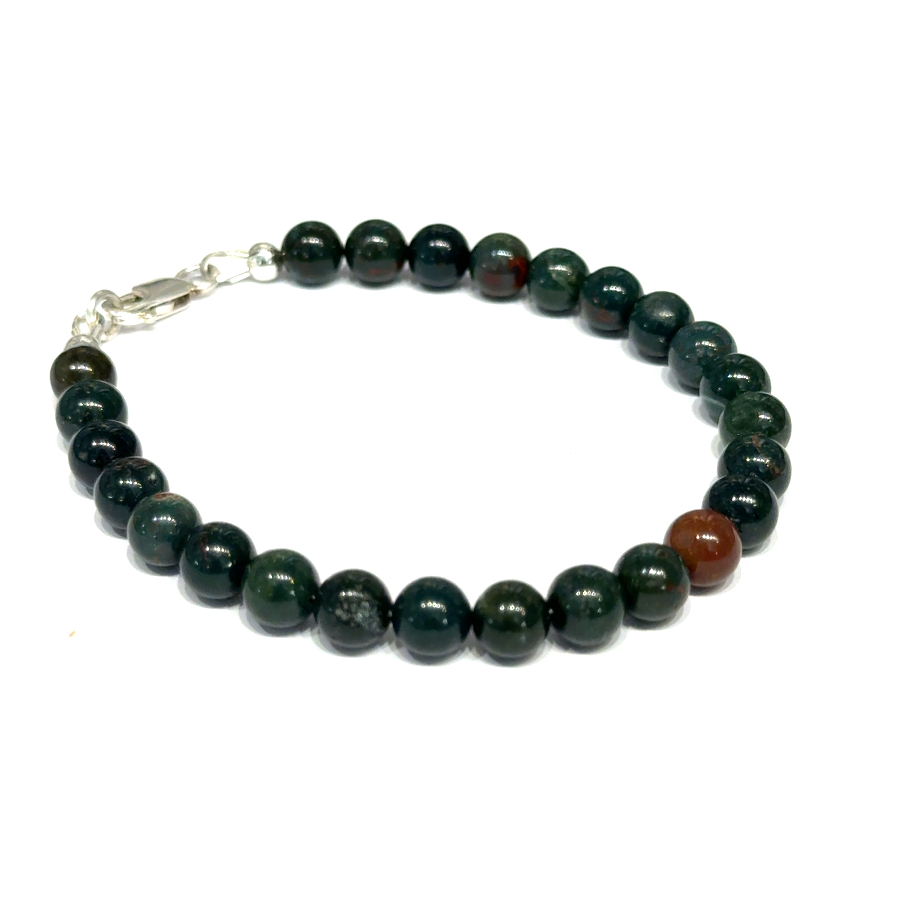 A close-up of polished bloodstone beaded gemstone bracelet  6mm size 7.25''  showing deep forest green jasper with natural red hematite inclusions on a white background, front right angle overview. 