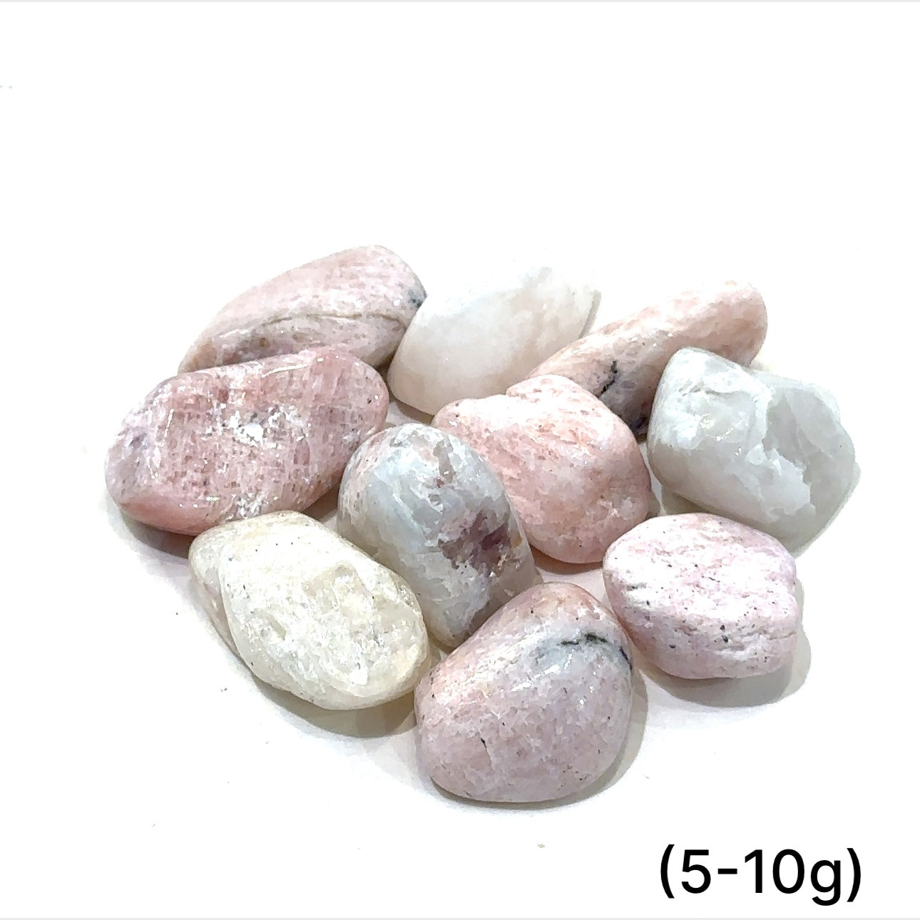 A collection of (5-10g) tumbled Petalite gemstones with a pink hue, displayed   on a white background, front overview.