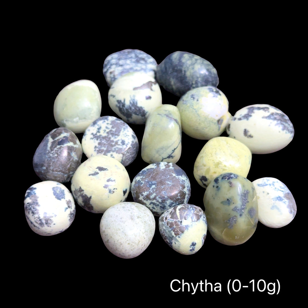A collection of Chytha gemstone weighing at (0-10g) on a black background, front overview.