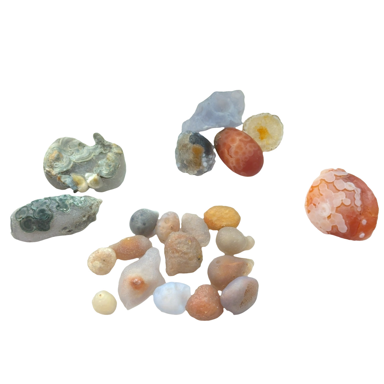 A collection of Natural Gobi Desert agate from Mongolia showing warm earth tone banding patterns, on a white background, front overview. 