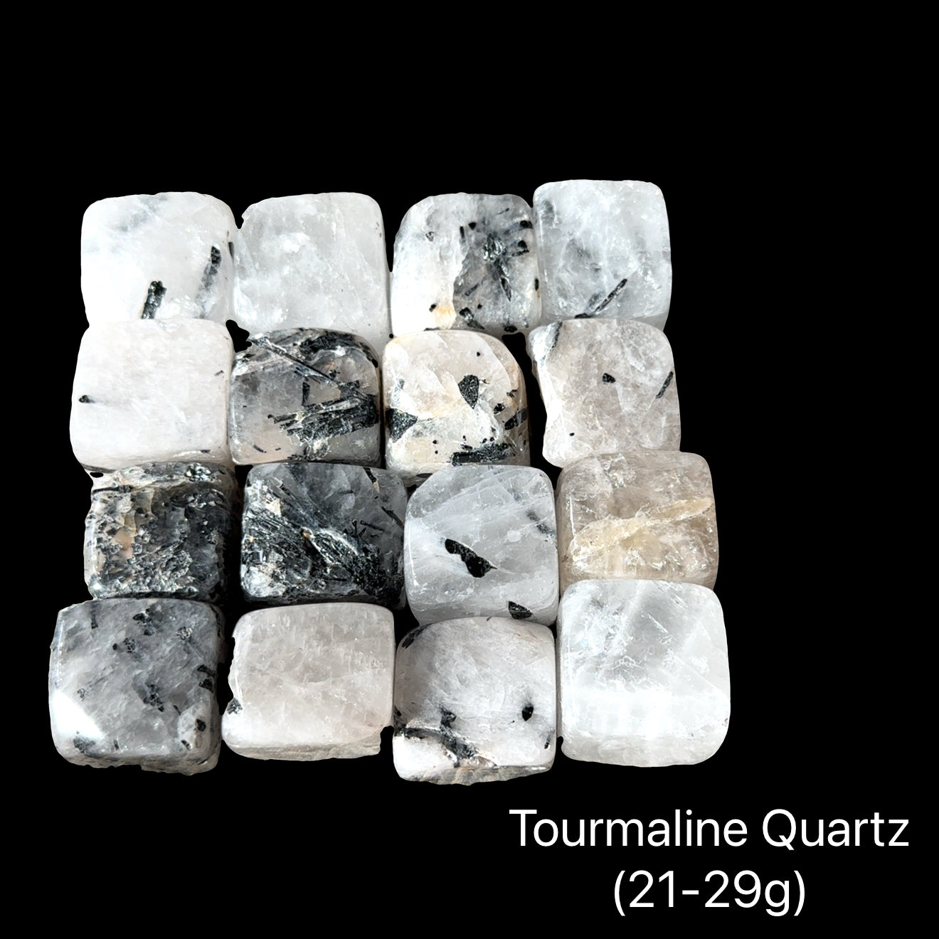 A collection of Tourmalinated Quartz tumbled gemstones displayed on a Black background, (21-29g) weight range, front overview.
