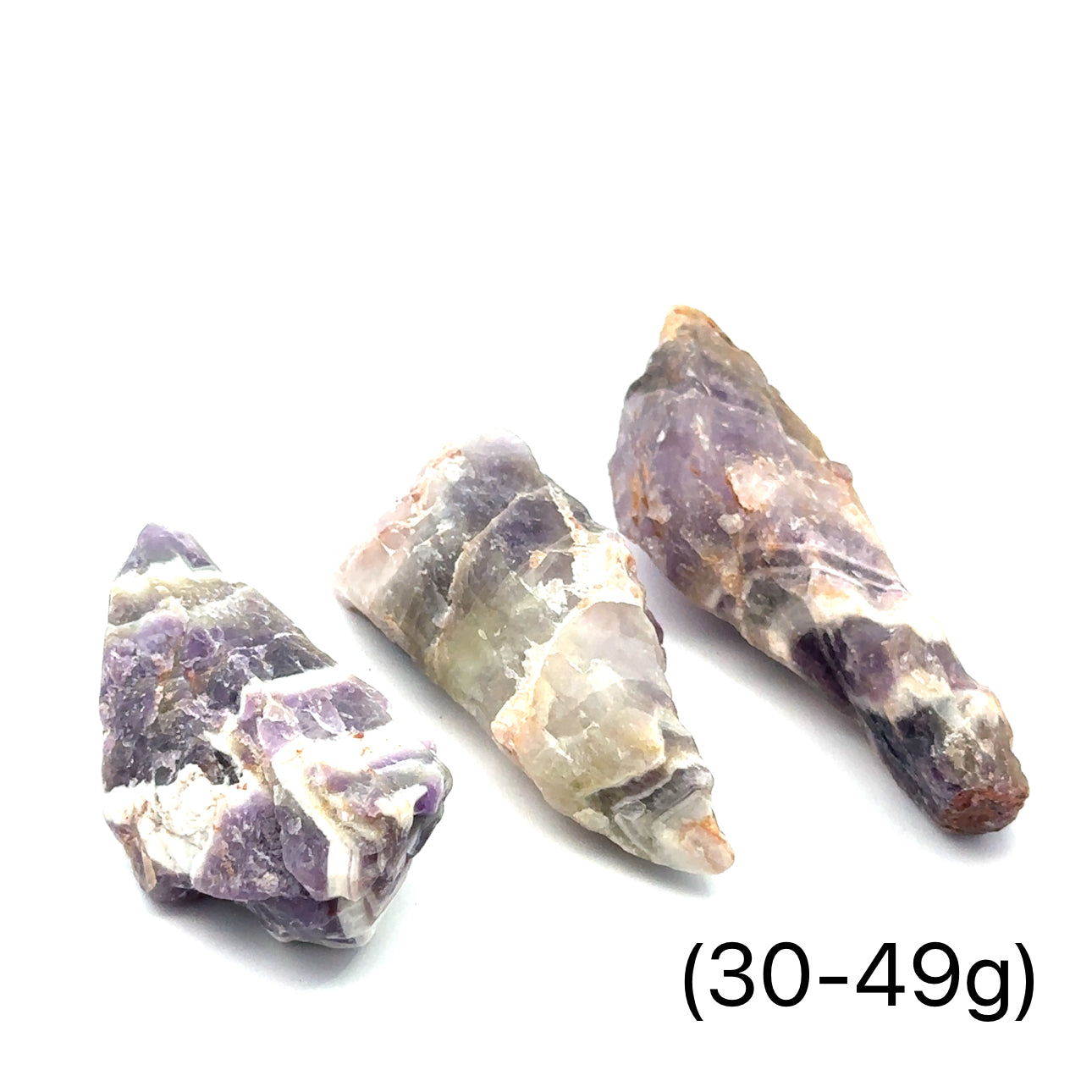 A collection of raw Amethyst or Prasiolite gemstones size (30-49g) on a white background, front view.