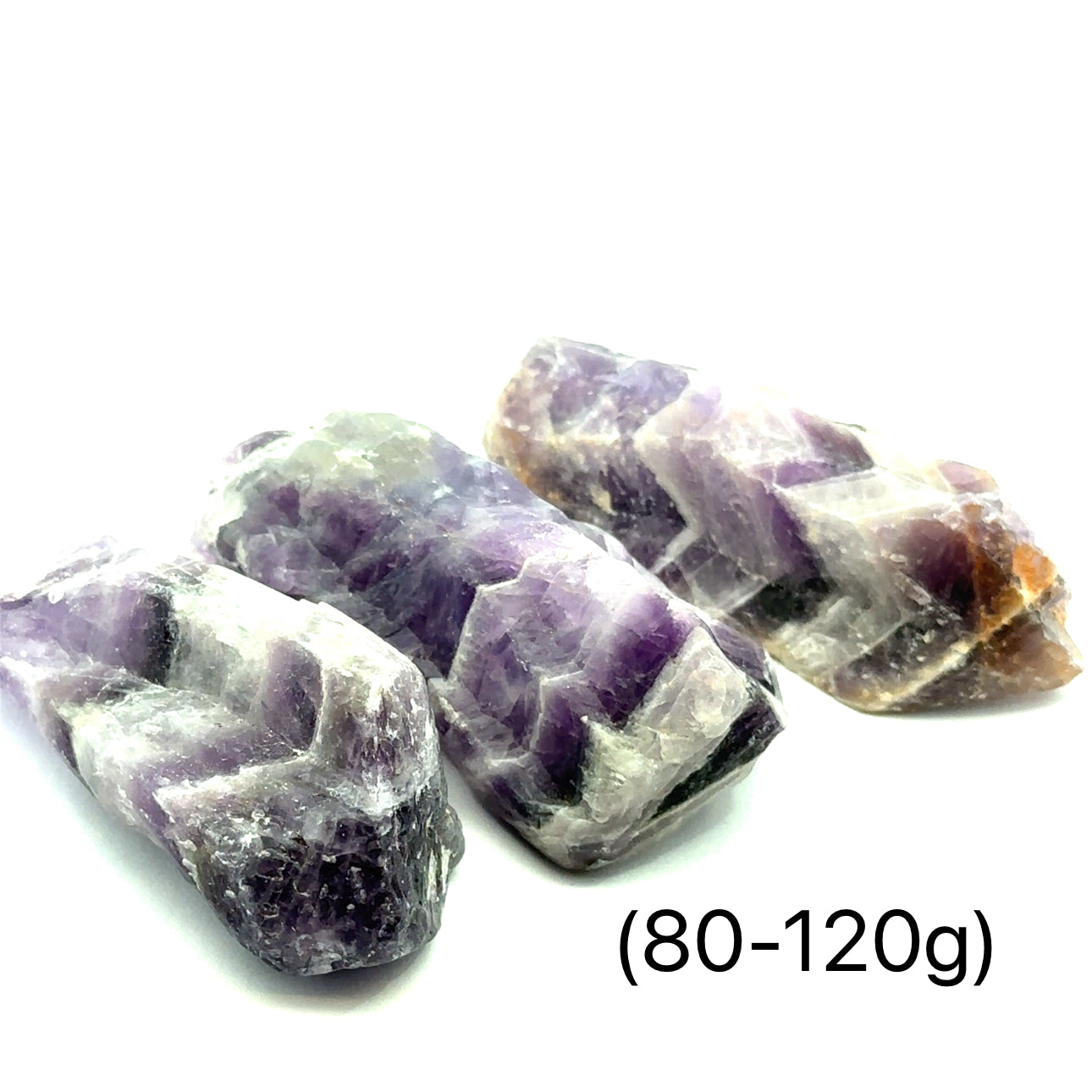 A collection of raw Amethyst or Prasiolite gemstones size (80-120g) on a white background, front view.
