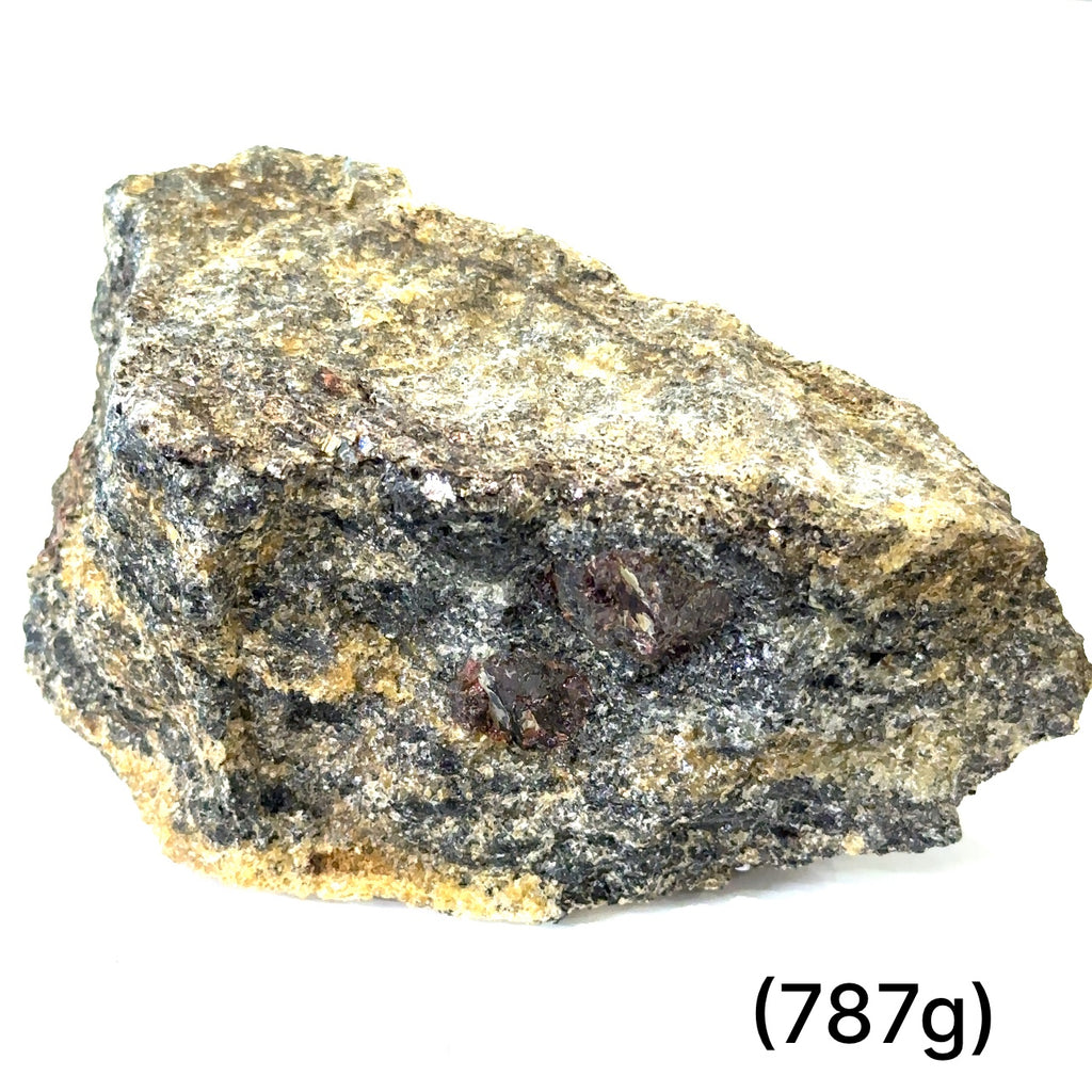 A collection of raw garnet gemstones with a rough, rugged texture in a natural color range of red and brown. on white (787g) front view