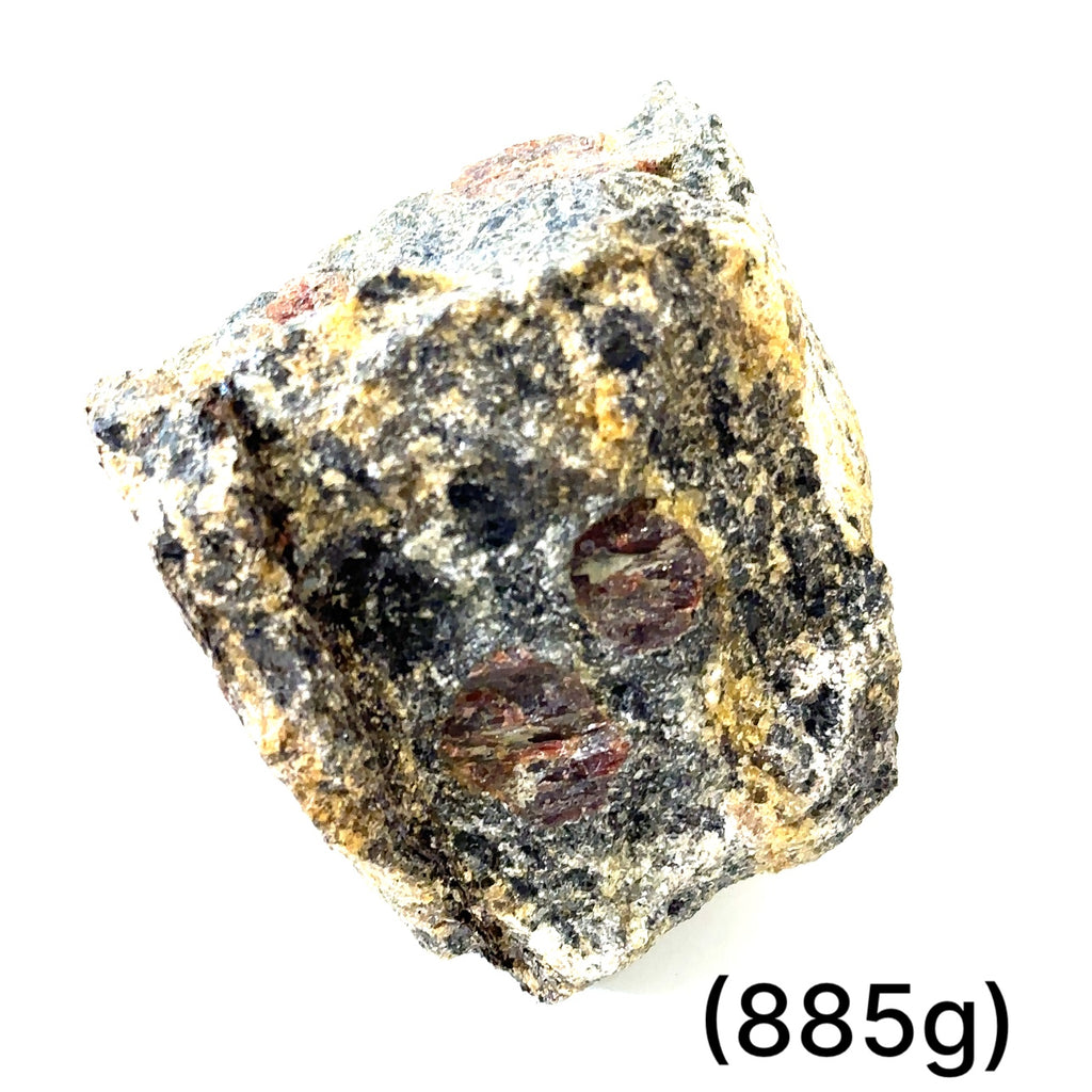 A collection of raw garnet gemstones with a rough, rugged texture in a natural color range of red and brown. on white (885g) front view