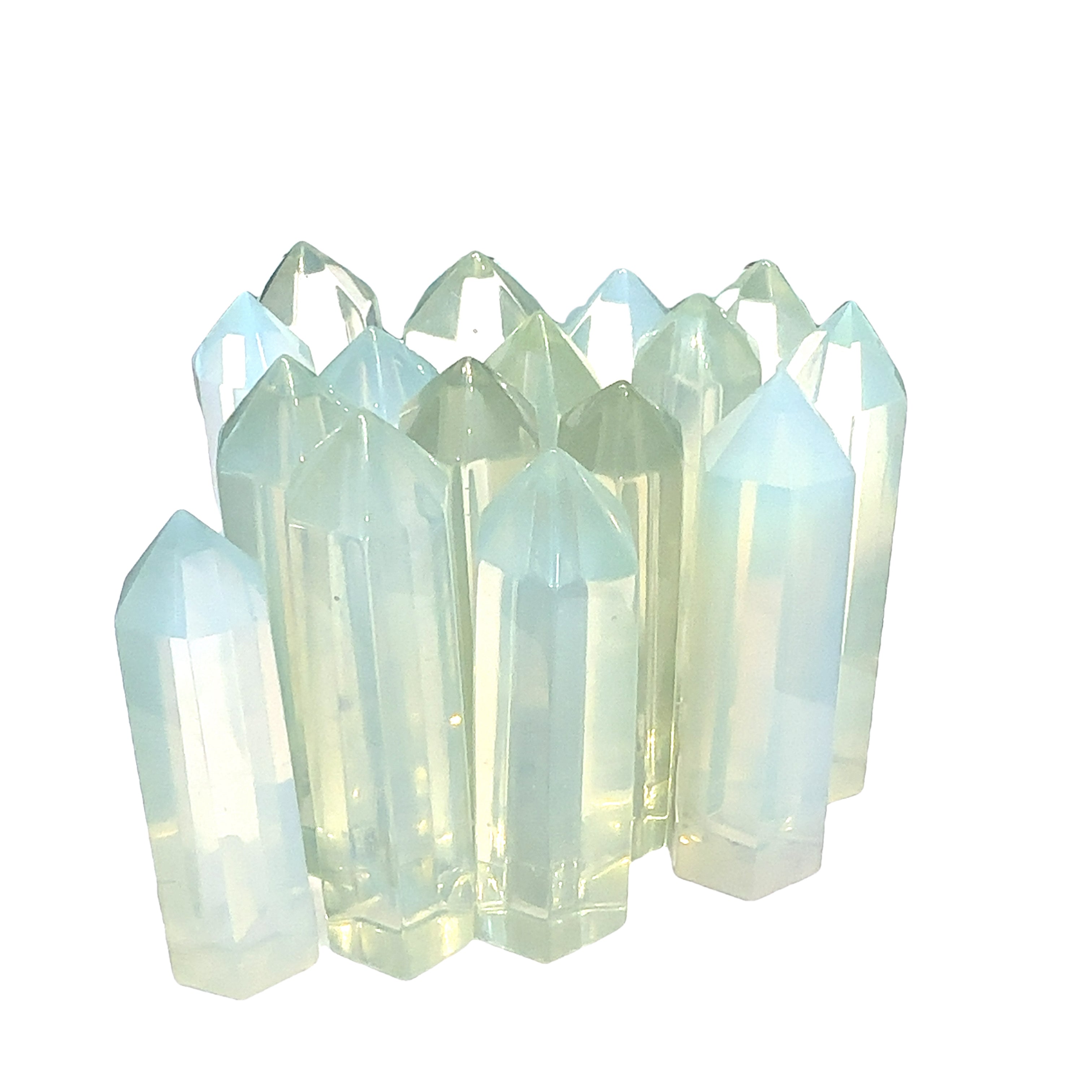 A collection of  transparent multicolored opalite gemstone tower against a white background, front view. 
