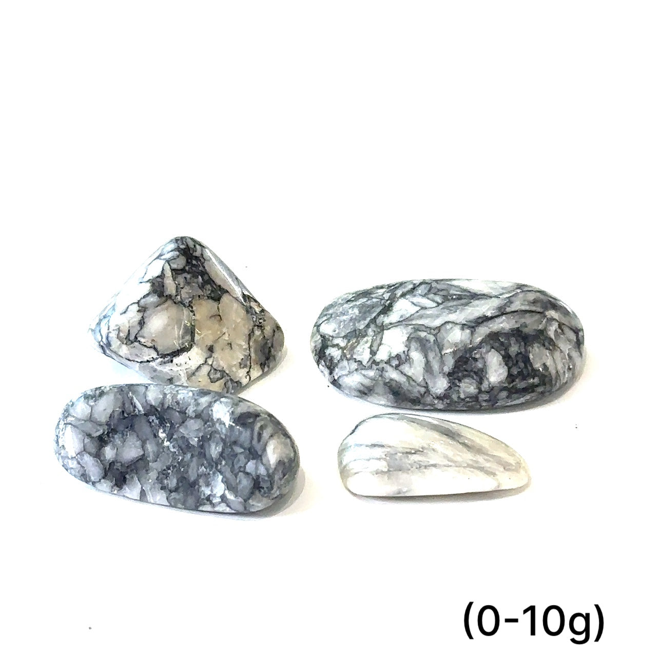 A collection of tumbled Pinolith gemstones (0=10g) displayed on a white background, with varying shades of gray and white patterns.