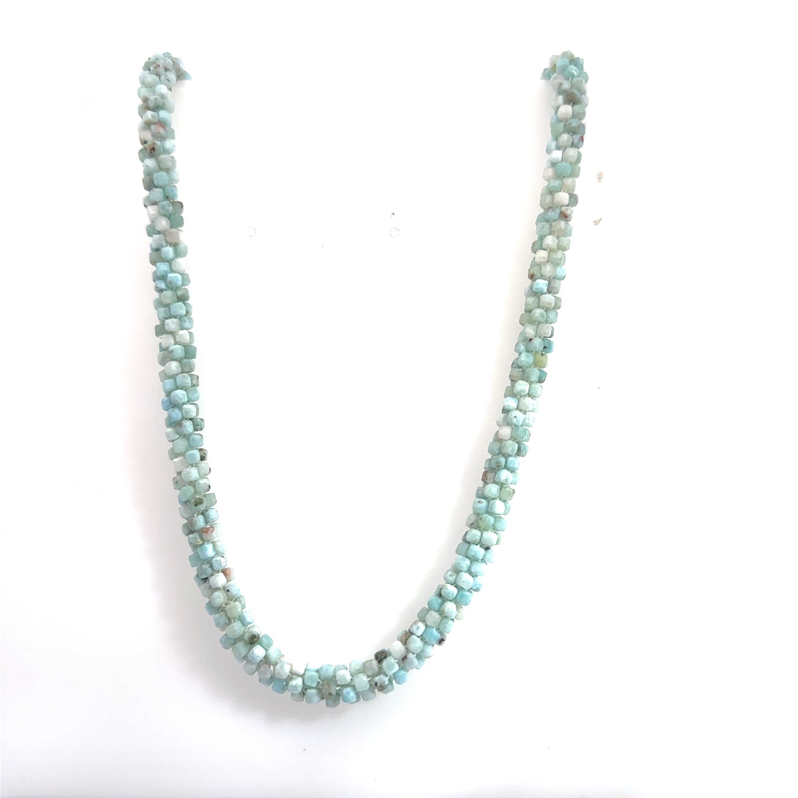 A crocheted necklace made with Larimar gemstone beads and a sterling silver butterfly box clasp on a white background, front long  hanging  overview. 