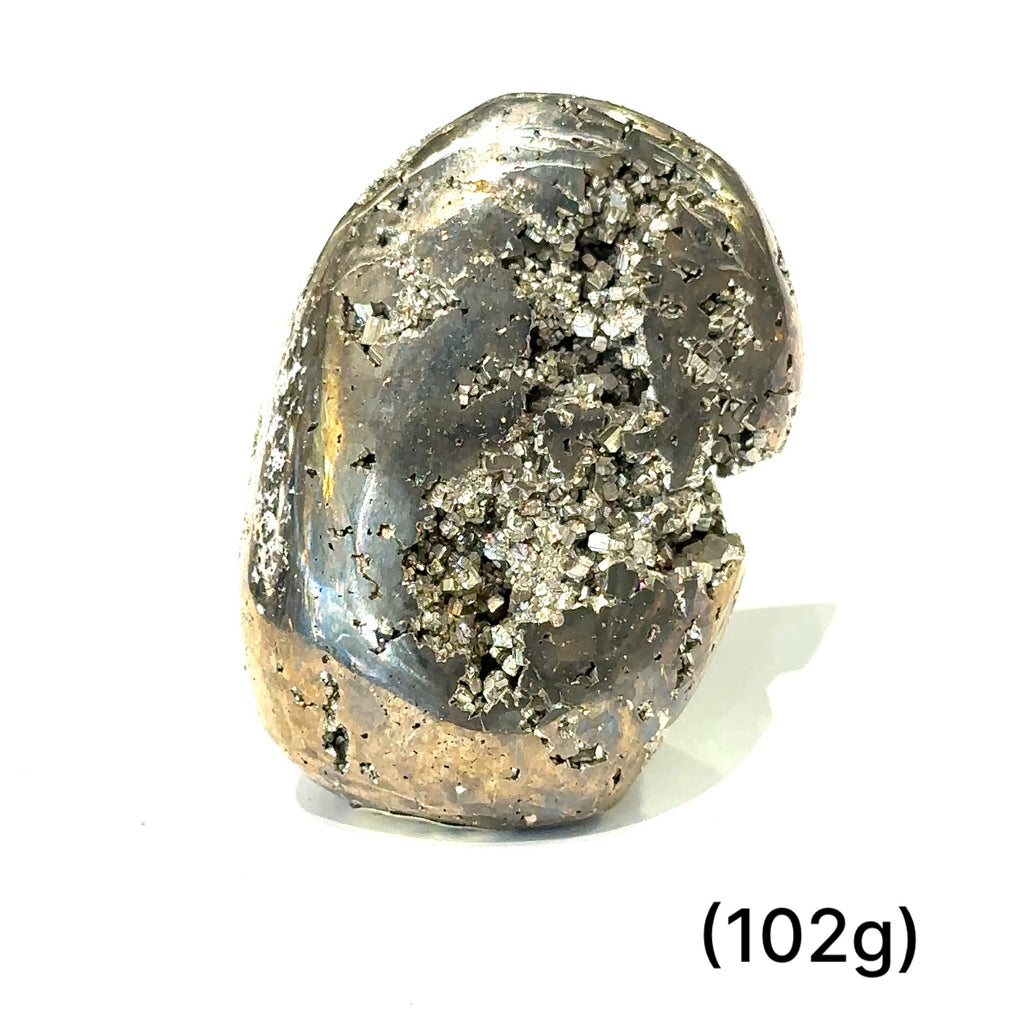 A free-form Pyrite gemstone with a rough, metallic surface, predominantly in shades of gray and gold, weighing 102 grams on the white front view