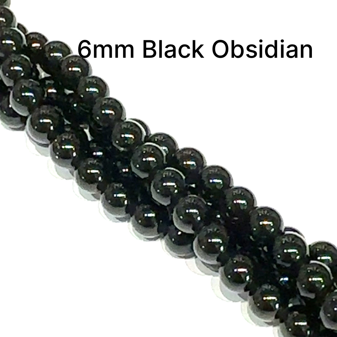 A group of strands of 6mm Black Obsidian smooth round gemstone beads on a white background, front overview. 