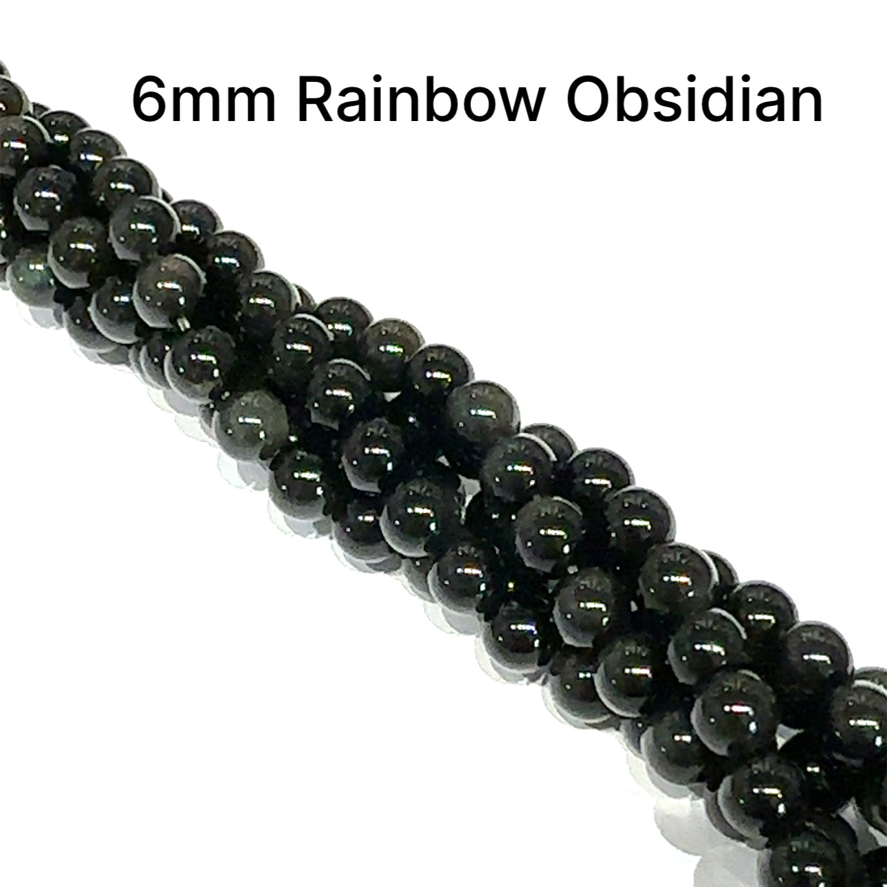 A group of strands of 6mm Rainbow Obsidian smooth round gemstone beads on a white background, front overview. 
