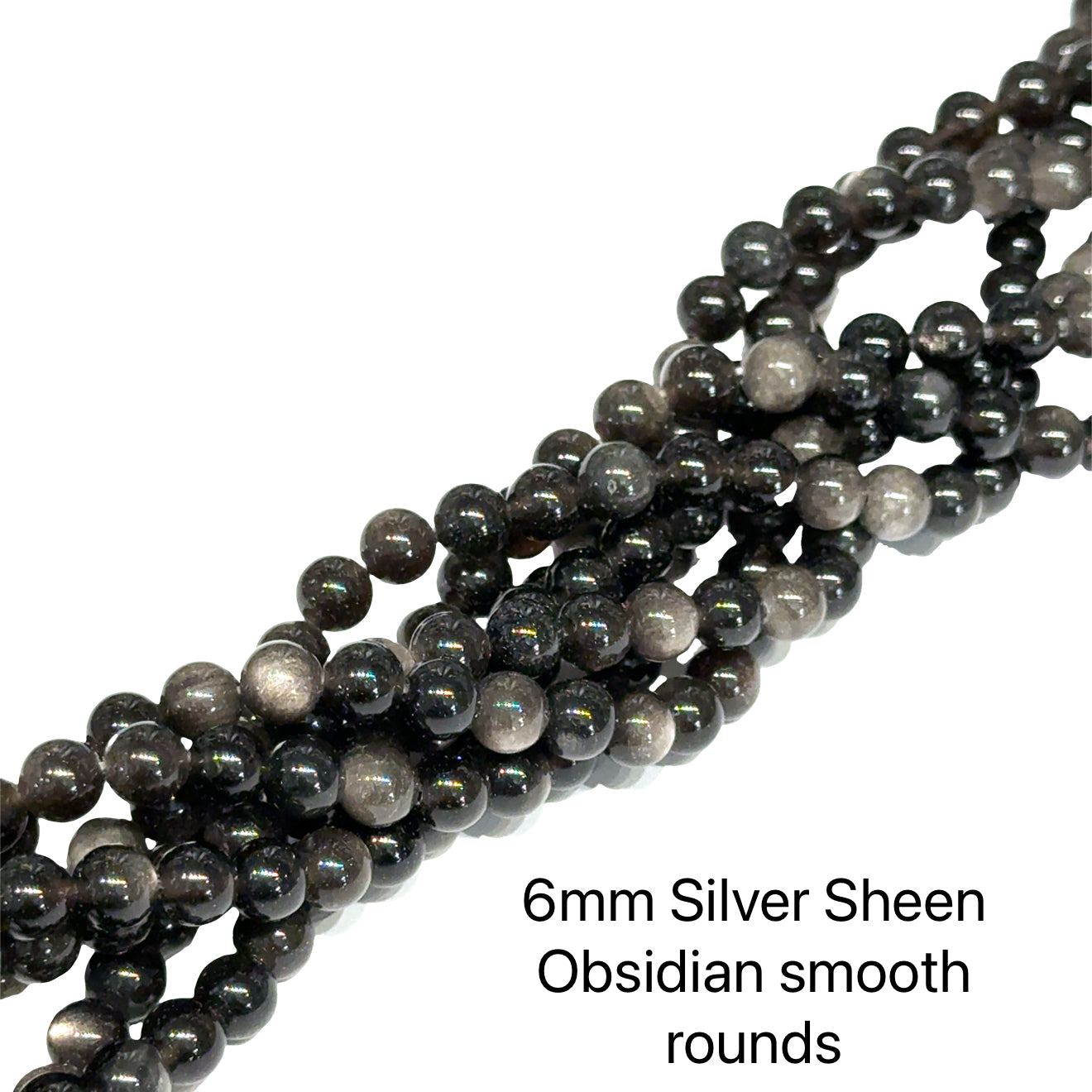 A group of strands of 6mm Silver Sheen  Obsidian smooth round gemstone beads on a white background, front overview. 