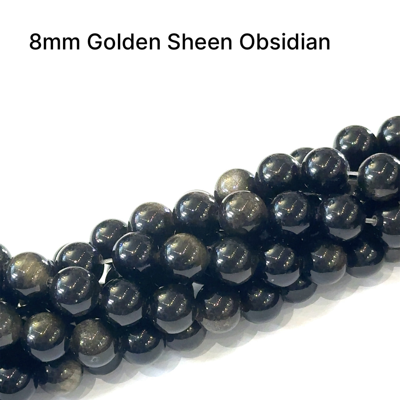 A group of strands of 8mm Golden Sheen Obsidian smooth round gemstone beads on a white background, front overview. 