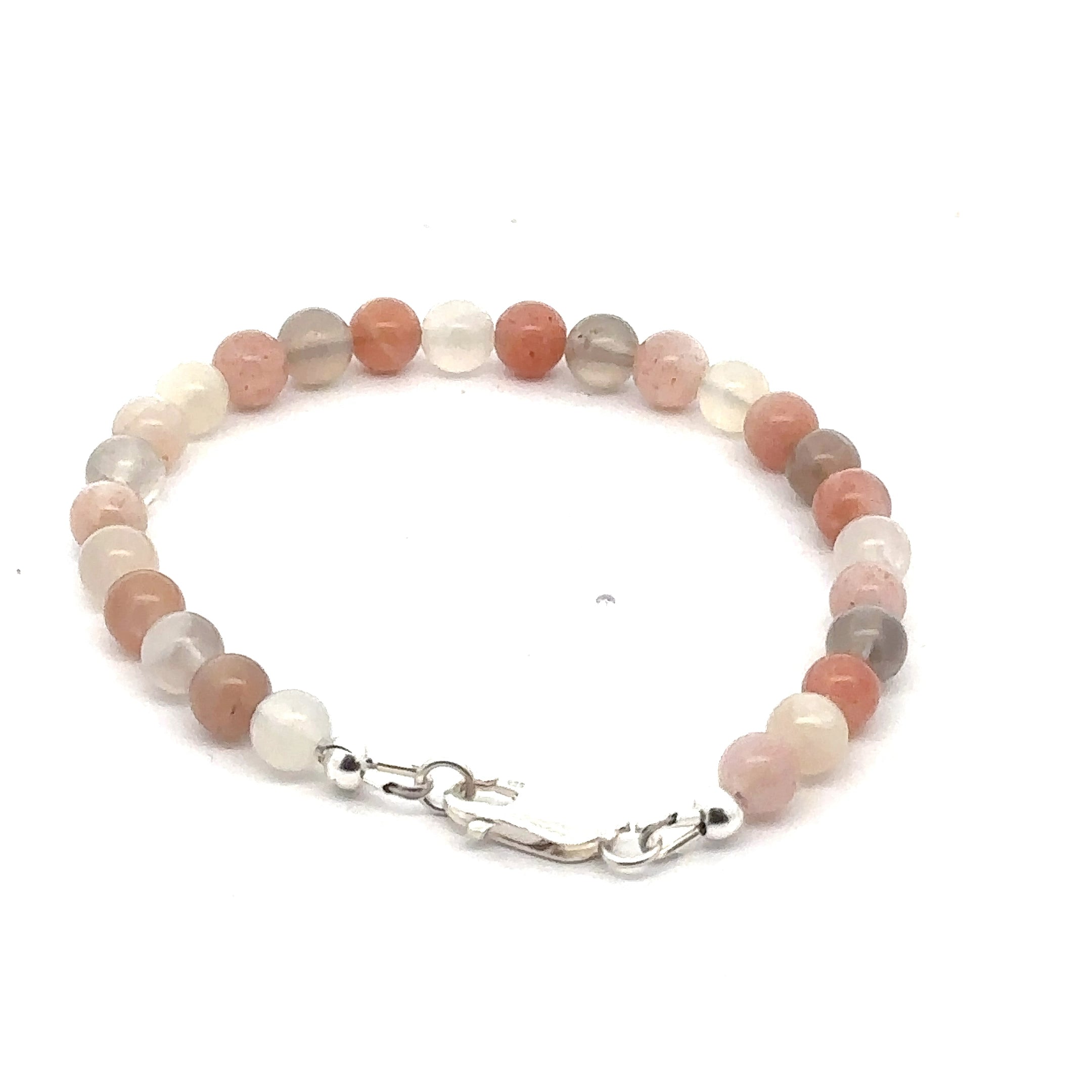 A mixed Moonstone gemstone beaded bracelet with a sterling silver lobster claw clasp on a white background, back, overview. 