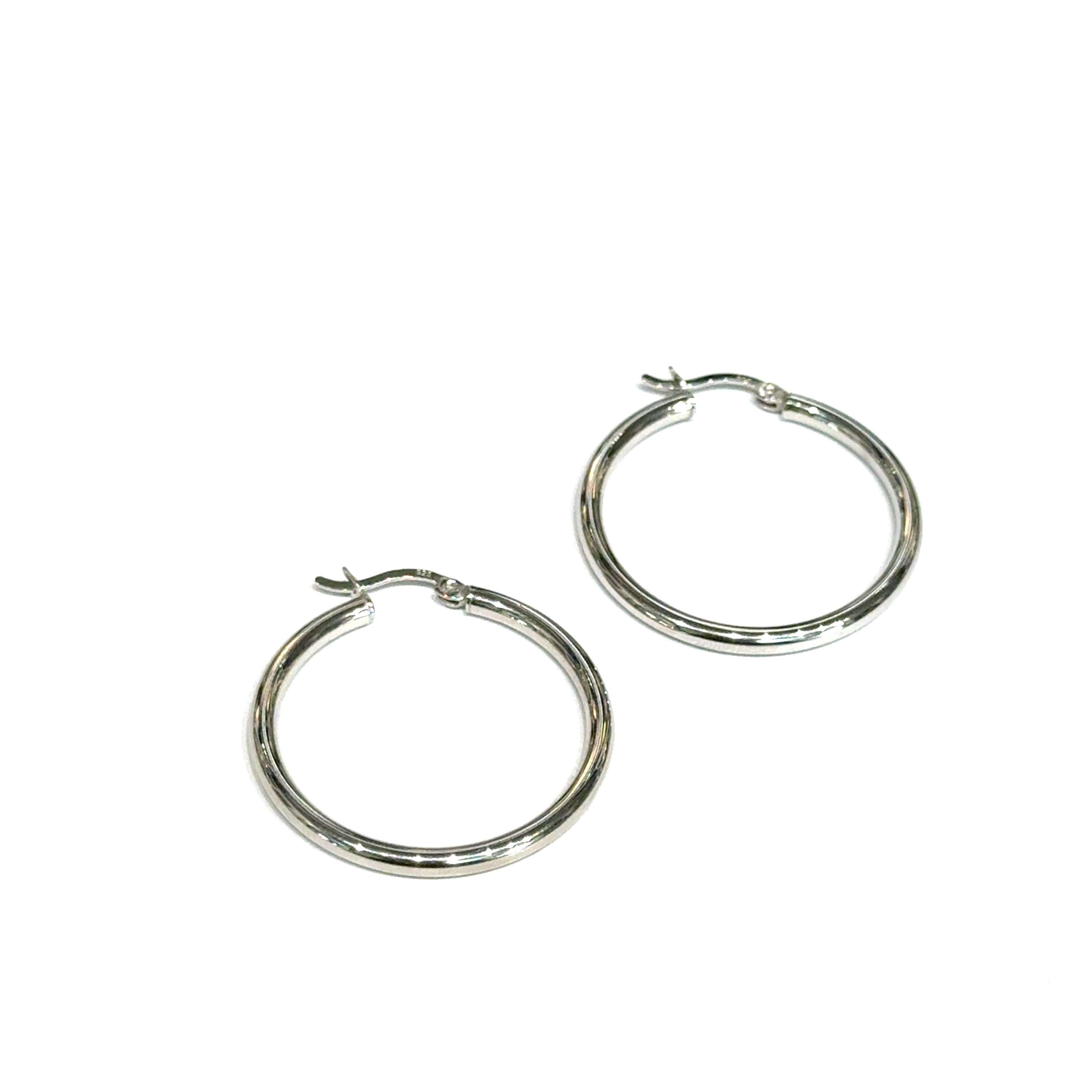 A pair of Sterling Silver Smooth Classic Round Hoop (Snapback)  31mm diameter, 4g on a white background, front overview. 