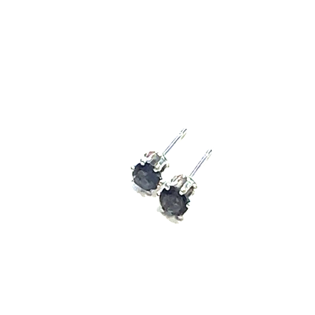A pair of sterling silver basket stud earrings with round blue iolite gemstones, showing the left angle down view with pushbacks and an close up overview