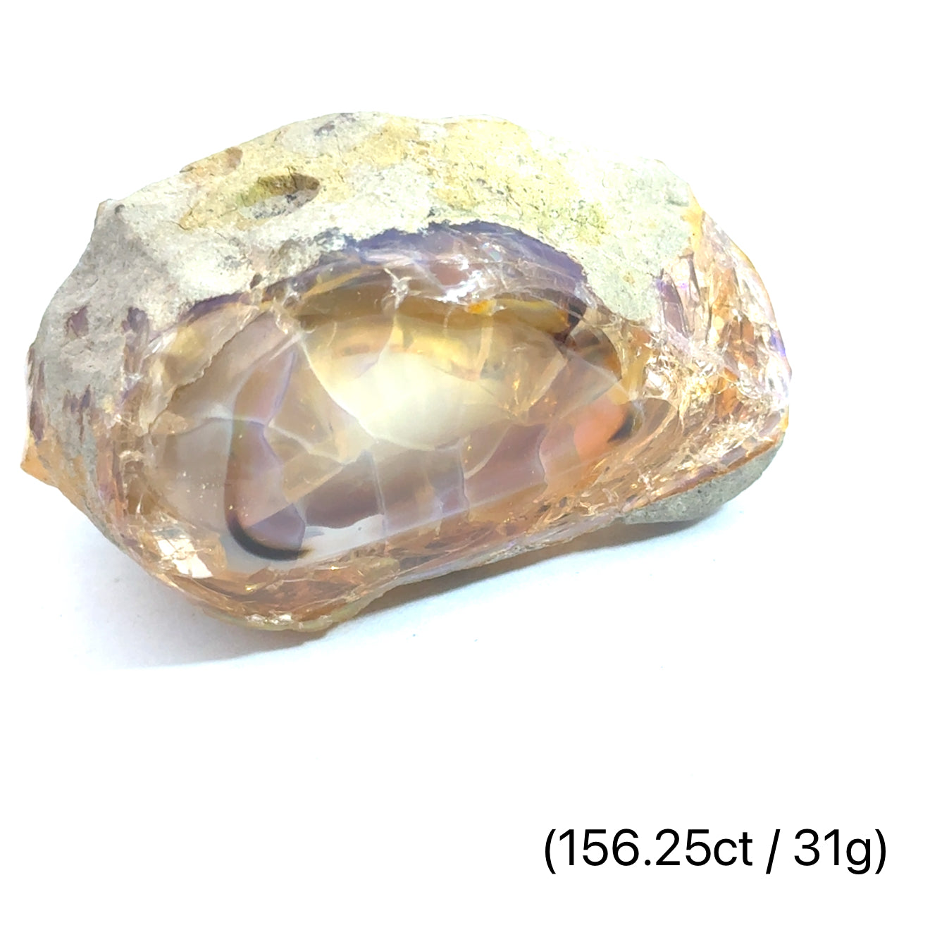 A raw Ethiopian opal gemstones with varying colors, displayed on a white background, 31g.