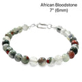 African bloodstone beaded bracelet with 6mm smooth round gemstones and sterling silver lobster claw clasp for courage and vitality on a white background, front view. 