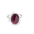 Almandine Garnet gemstone sterling silver ring on a white background, front view.  